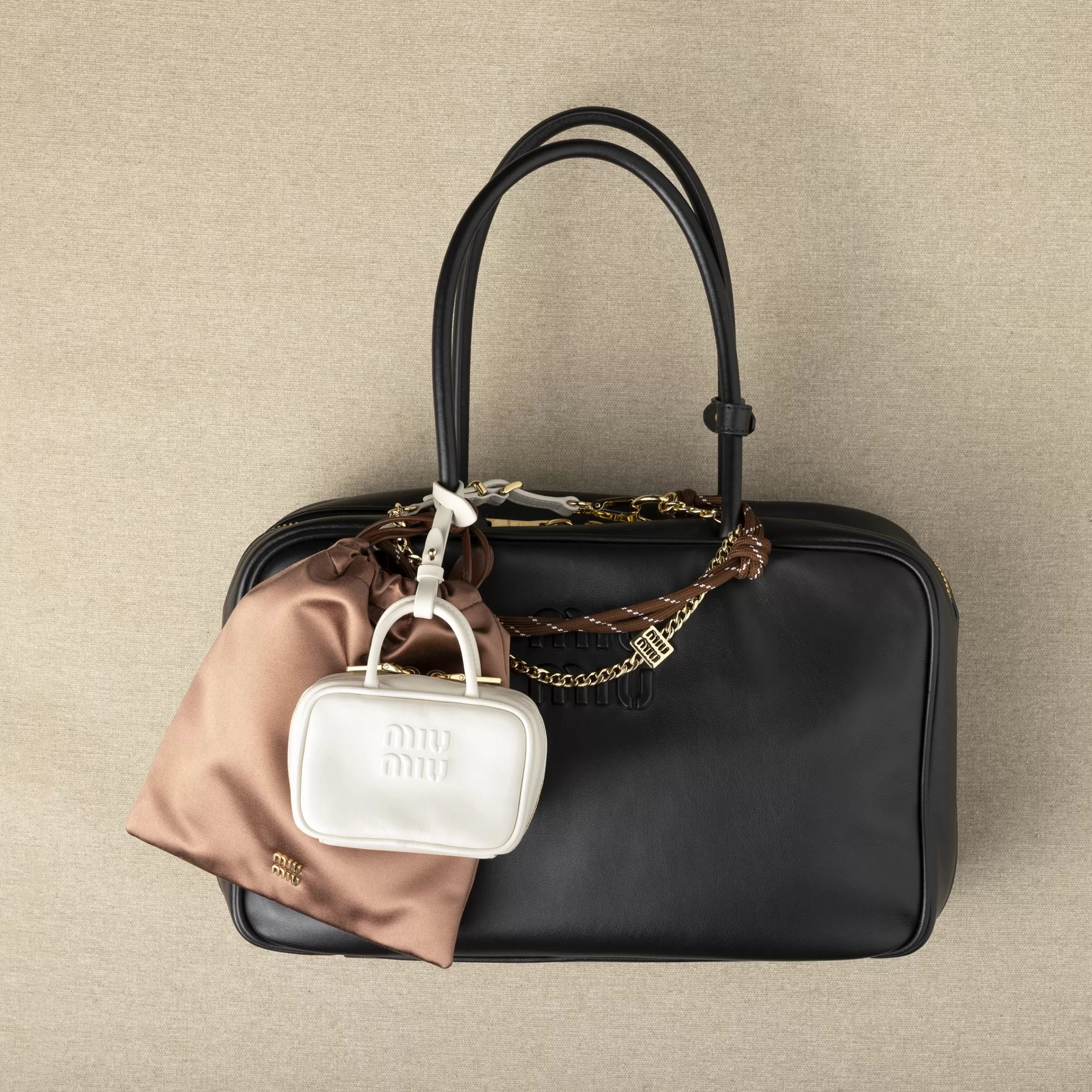 Leather, cord, and metal trick>Miu Miu New