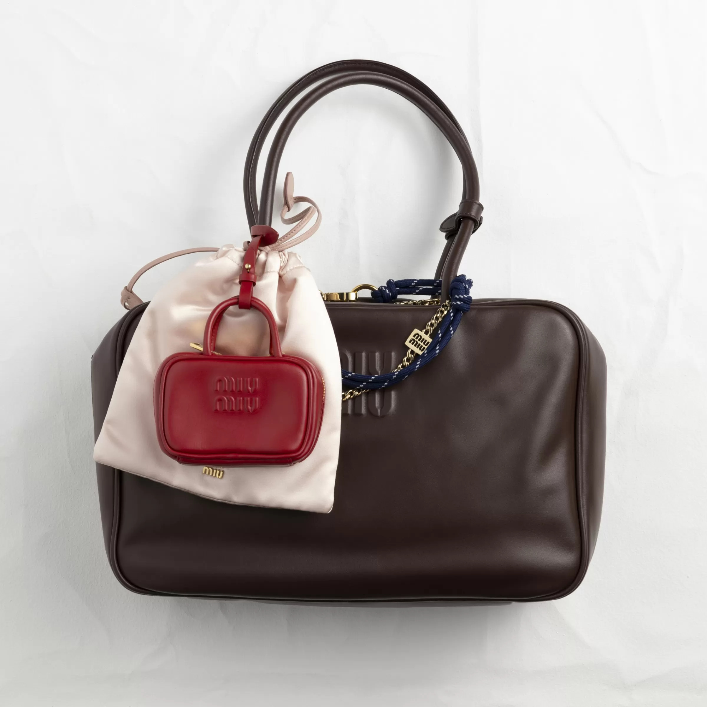 Leather, cord, and metal trick>Miu Miu New