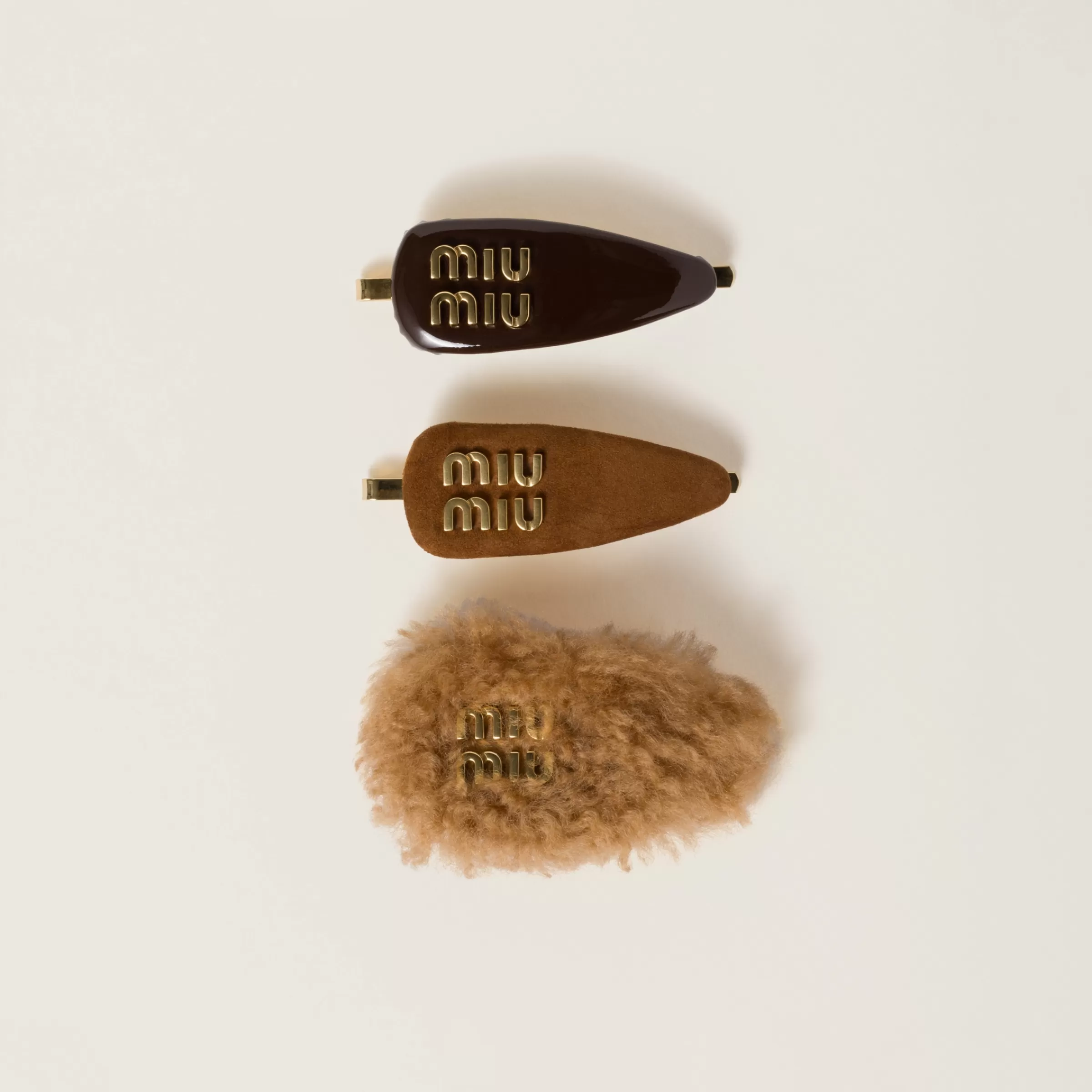 Set of leather, suede, and shearling hair clips>Miu Miu Outlet
