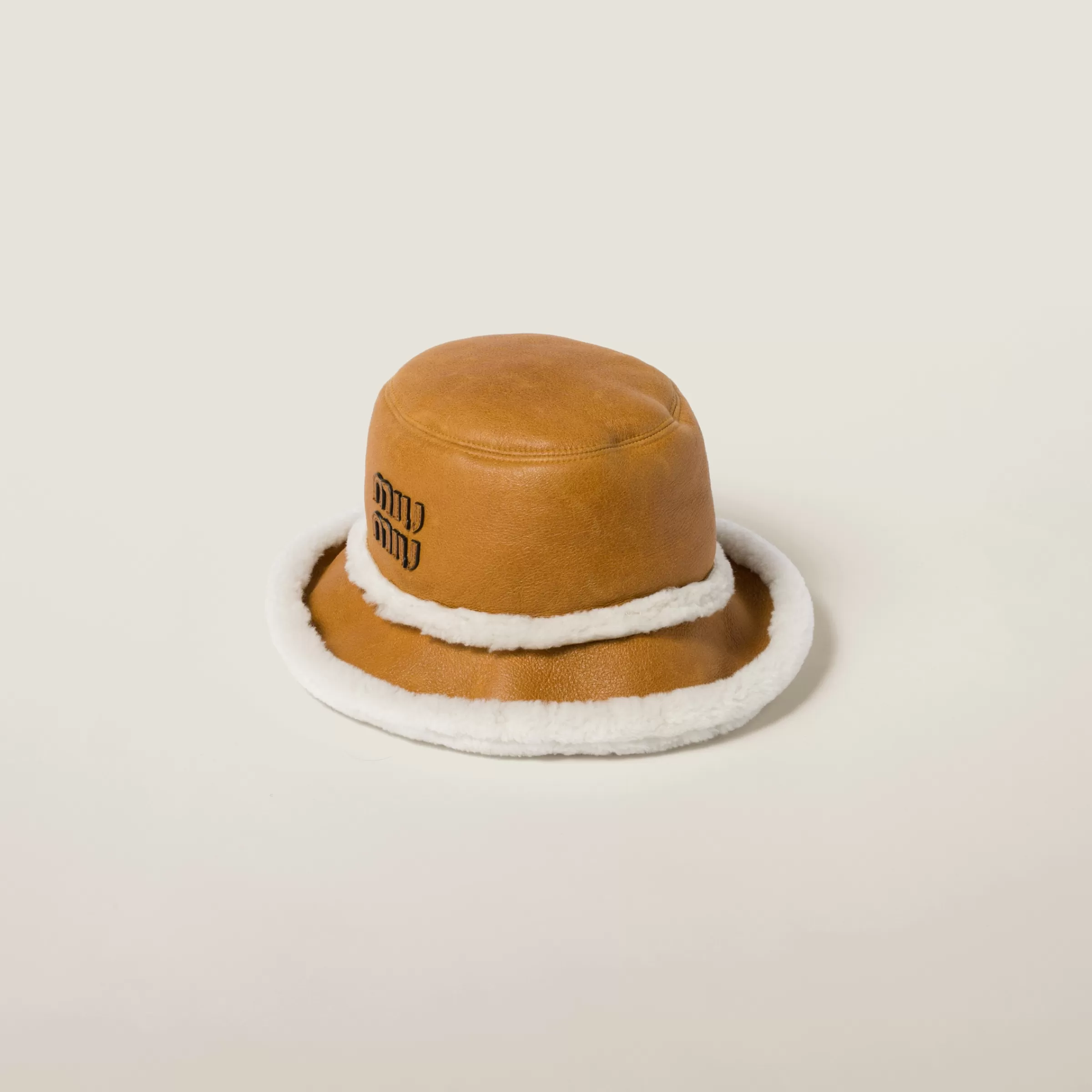 Shearling bucket hat>Miu Miu Shop