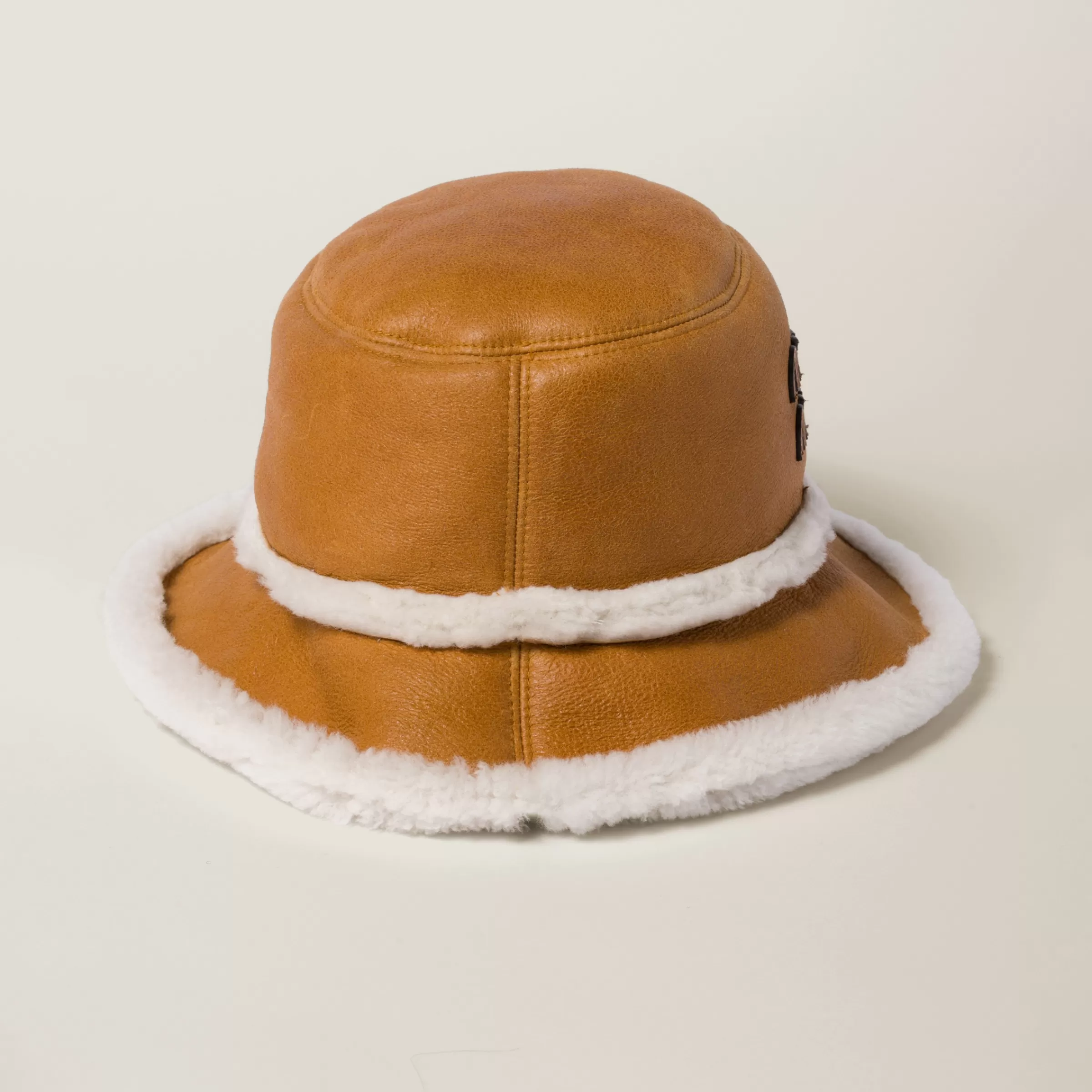 Shearling bucket hat>Miu Miu Shop