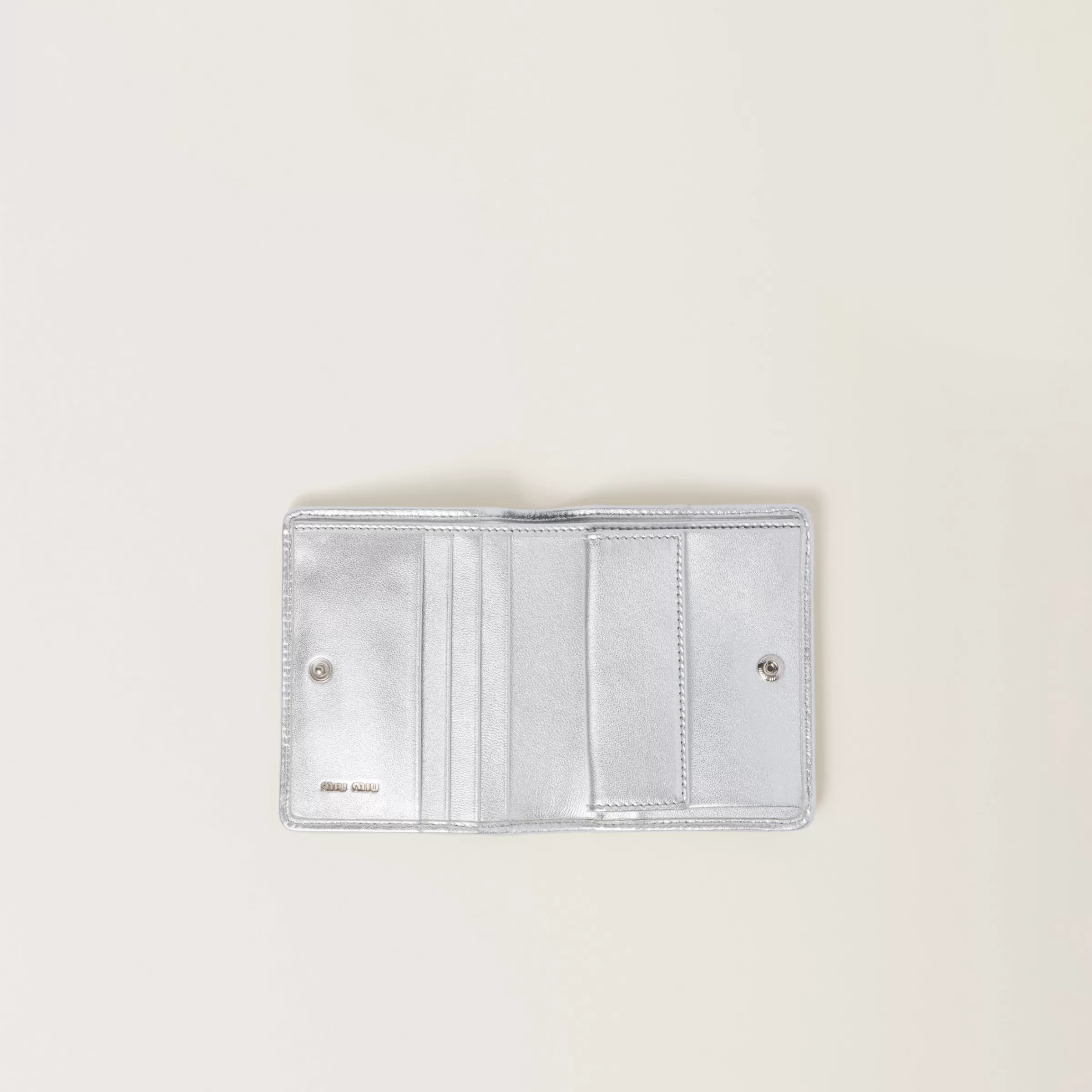 Small matelassé nappa leather wallet>Miu Miu Store